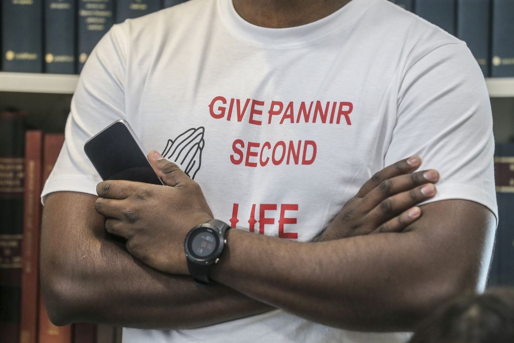 A family member is pictured wearing a t-shirt in support of Singapore death row inmate P. Pannir Selvam during a press conference in Petaling Jaya July 5, 2019. u00e2u20acu201d Picture by Firdaus Latif