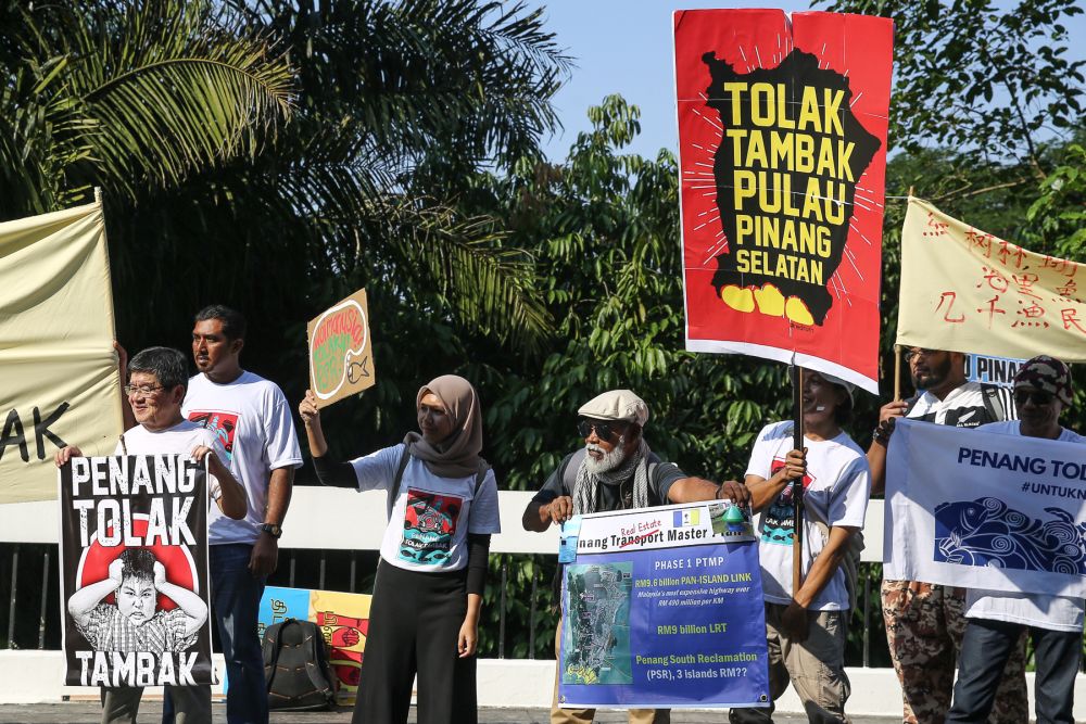 Fishermen from Penang and Perak gather outside the Parliament building to protest against the Penang South Reclamation project in Kuala Lumpur July 11, 2019. u00e2u20acu201d Picture by Yusof Mat Isa
