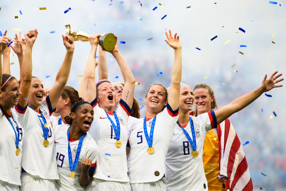 Megan Rapinoe (centre) celebrates with the trophy after winning the Fifa Women's World Cup final between the US and Netherlands in Lyon July 7, 2019. u00e2u20acu201d Reuters pic