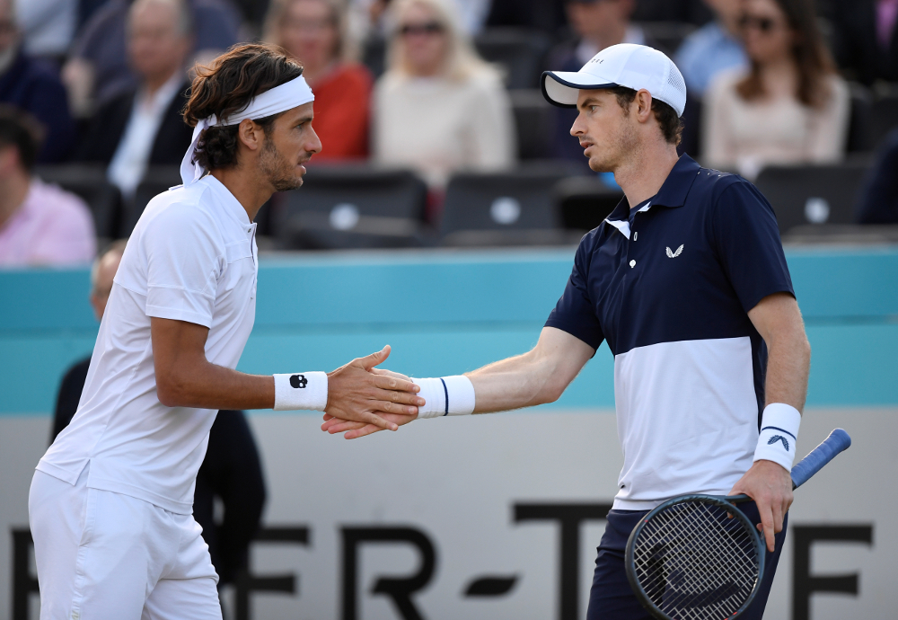 Britainu00e2u20acu2122s Andy Murray and Spainu00e2u20acu2122s Feliciano Lopez high five during their Fever-Tree Championships semi-final doubles match at The Queenu00e2u20acu2122s Club, London June 22, 2019. u00e2u20acu201d Picture by Action Images via Reuters/Tony Ou00e2u20acu2122Brien