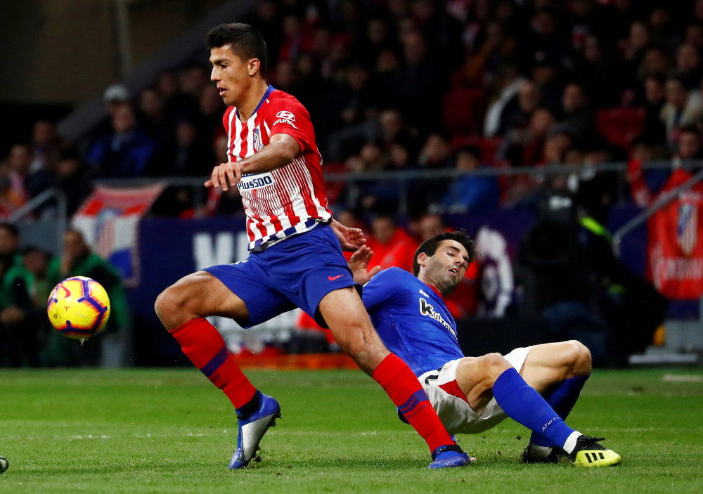 Atletico Madridu00e2u20acu2122s Rodri in action with Athletic Bilbaou00e2u20acu2122s Markel Susaeta during their La Liga Santander match at Wanda Metropolitano, Madrid November 10, 2018. u00e2u20acu201d Reuters pic