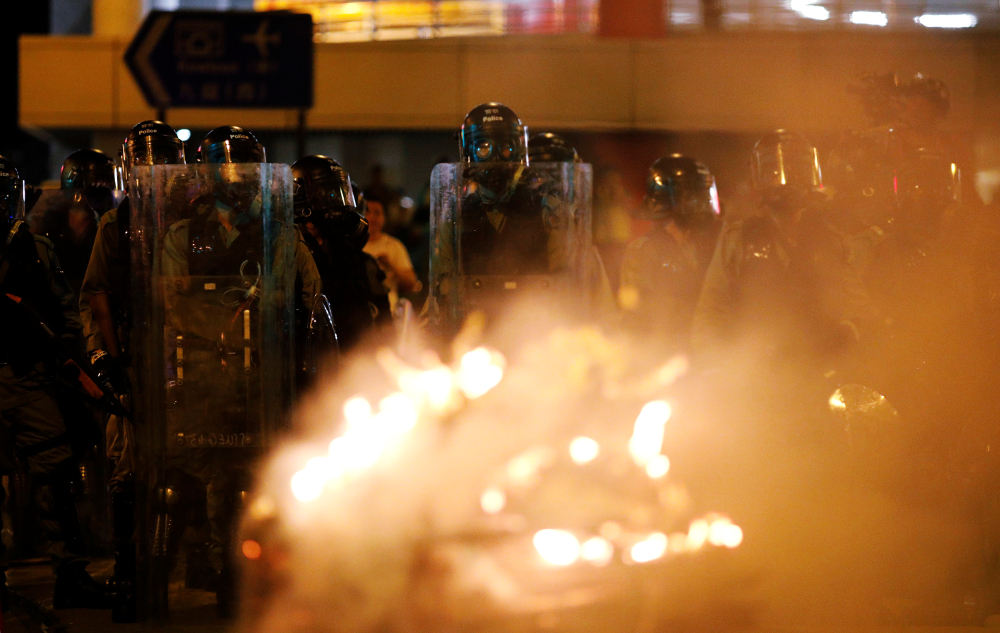 Police officers line up during a protest against police violence during previous marches, near Chinau00e2u20acu2122s Liaison Office, Hong Kong July 28, 2019. u00e2u20acu201d Reuters pic