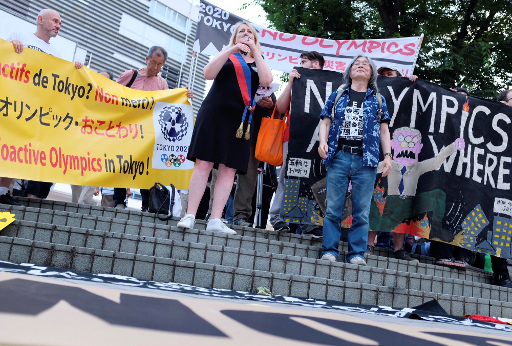 People protest against the Tokyo 2020 Olympics on the day marking one year out from the start of the summer games, at Shinjuku district in Tokyo July 24, 2019. u00e2u20acu201d Reuters pic