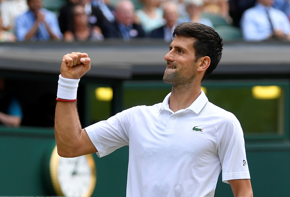 Serbiau00e2u20acu2122s Novak Djokovic celebrates after winning his Wimbledon quarter final match against Belgiumu00e2u20acu2122s David Goffin at the All England Lawn Tennis and Croquet Club, London July 10, 2019. u00e2u20acu201d Reuters pic