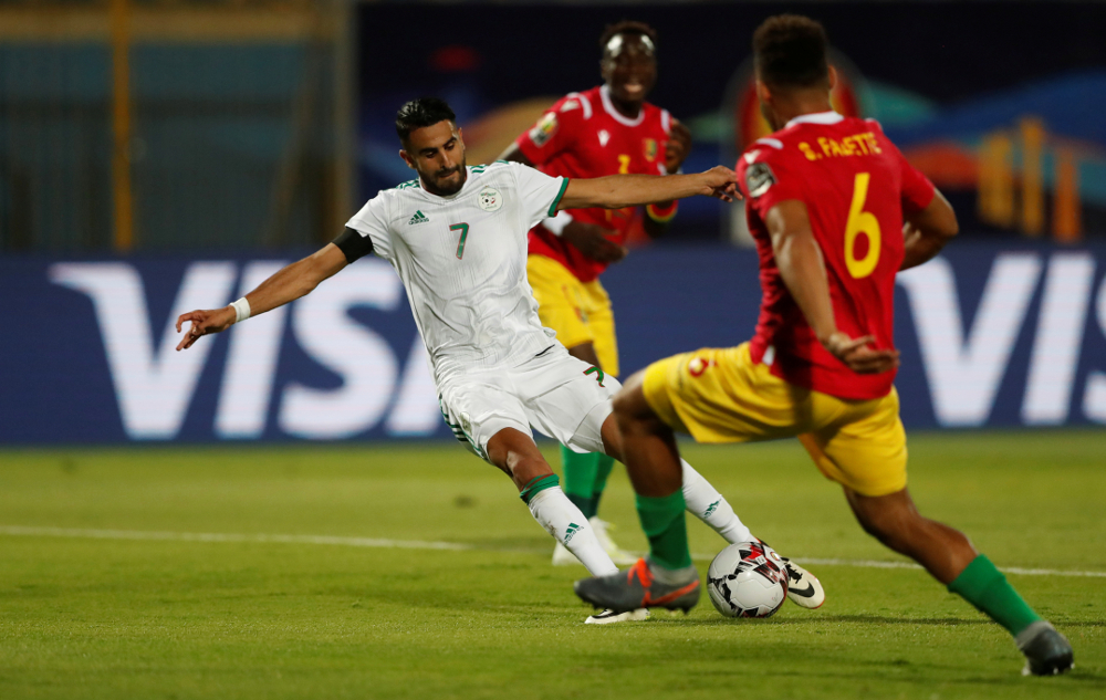 Algeriau00e2u20acu2122s Riyad Mahrez scores their second goal during their Africa Cup of Nations 2019 Round of 16 match against Guinea at the 30 June Stadium, Cairo July 7, 2019. u00e2u20acu201d Reuters pic