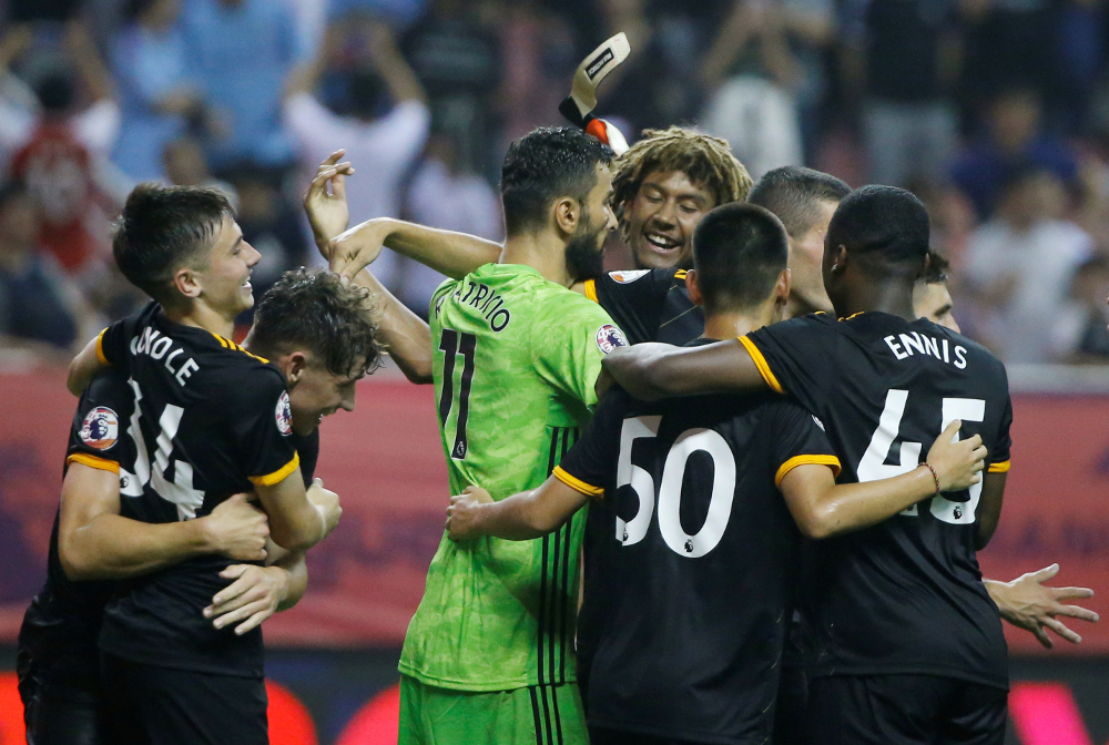 Wolverhampton Wanderersu00e2u20acu2122 Rui Patricio celebrates with team mates after making the decisive save of the penalty shootout at the Premier League Asia Trophy match against Manchester City at Hongkou Football Stadium, Shanghai July 20, 2019. u00e2u20acu201d Reuters pic