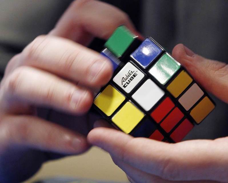 How long does it take you to solve a Rubik's cube puzzle? Researchers have created an algorithm that can solve it in under a minute. u00e2u20acu2022 AFP pic