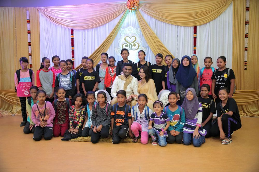 Samuel, his wife Dr Shamini and the children at their Indian wedding ceremony.