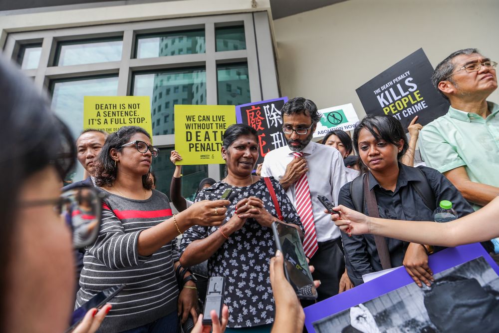 Letchumi Arumugam (centre), mother of Datchinamurthy Kataiah, speaks to reporters outside the Singapore High Commission in Kuala Lumpur July 25, 2019. u00e2u20acu201d Picture by Ahmad Zamzahuri