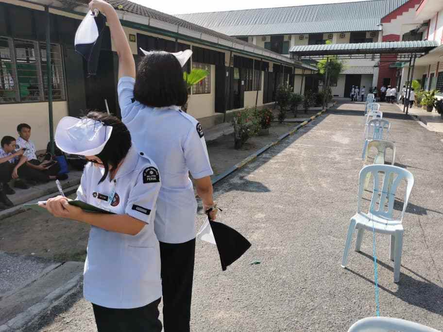 A flag signalling competition underway during the event organised by St John Ambulance Malaysia, Perak chapter. — Picture courtesy of St John Ambulance Malaysia, Perak chapter