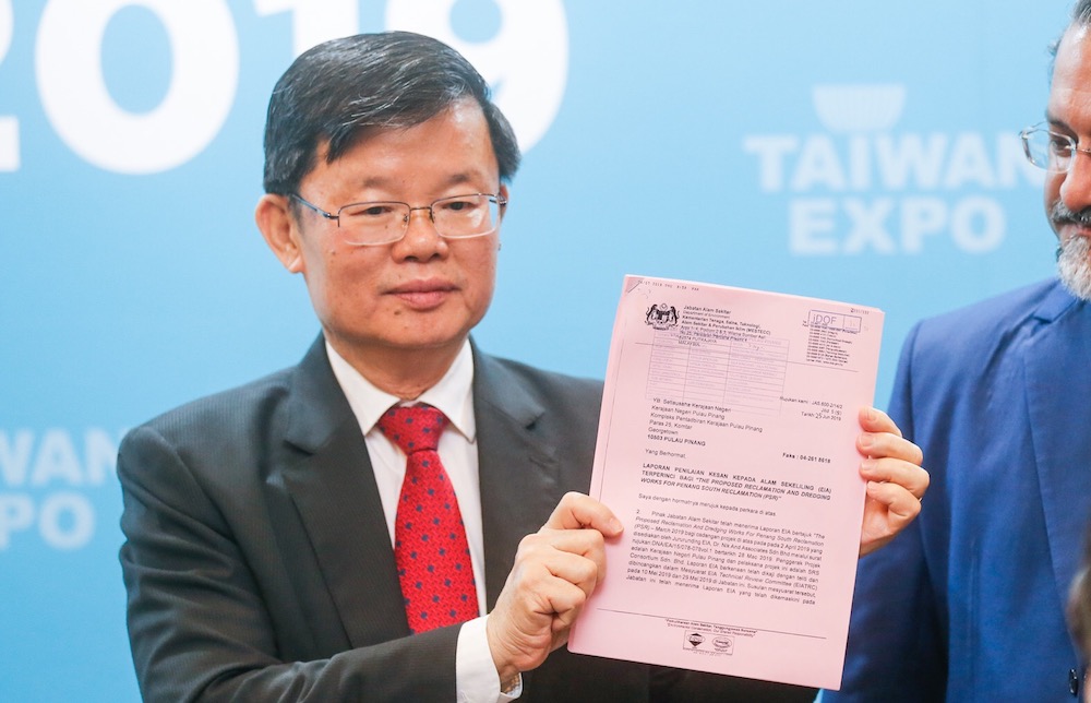 Penang Chief Minister Chow Kon Yeow shows the faxed letter from Department of Environment during the opening of the 2019 Taiwan Expo in George Town July 5, 2019. u00e2u20acu201d Picture by Sayuti Zainudin