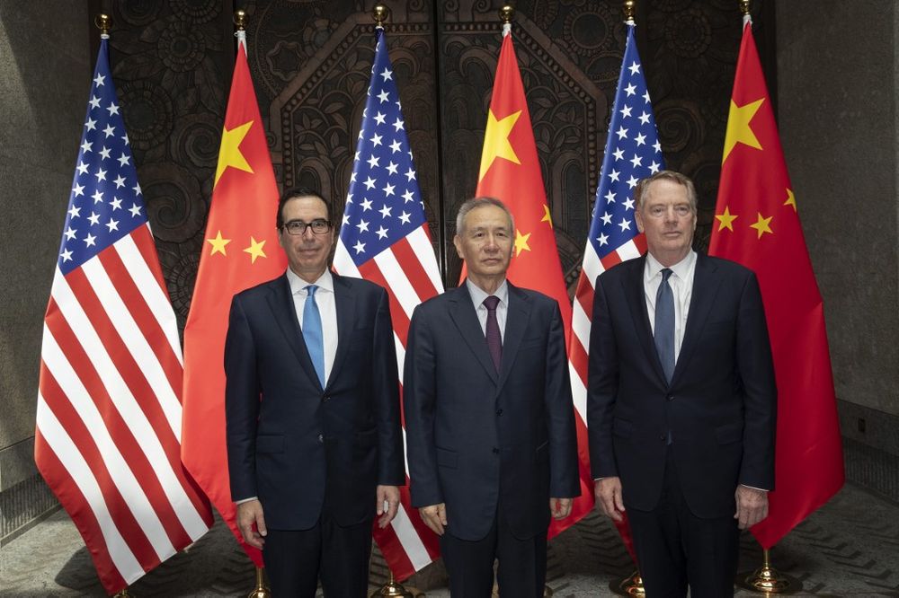 Chinese Vice Premier Liu He (centre) with US Trade Representative Robert Lighthizer (right) and Treasury Secretary Steven Mnuchin pose for photos before holding talks at the Xijiao Conference Center, Shanghai, July 31, 2019. u00e2u20acu201d AFP pic