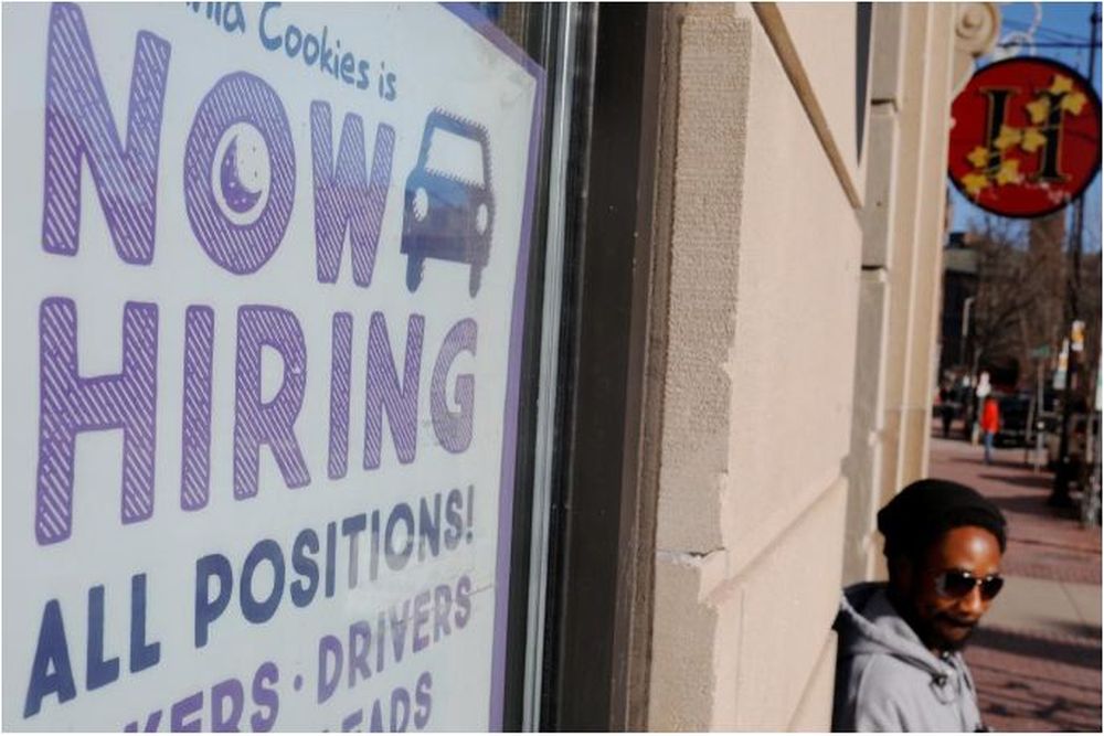 A u00e2u20acu02dcNow Hiringu00e2u20acu2122 sign sits in the window of Insomnia Cookies in Cambridge, Massachusetts, February 11, 2019. u00e2u20acu201d Reuters pic