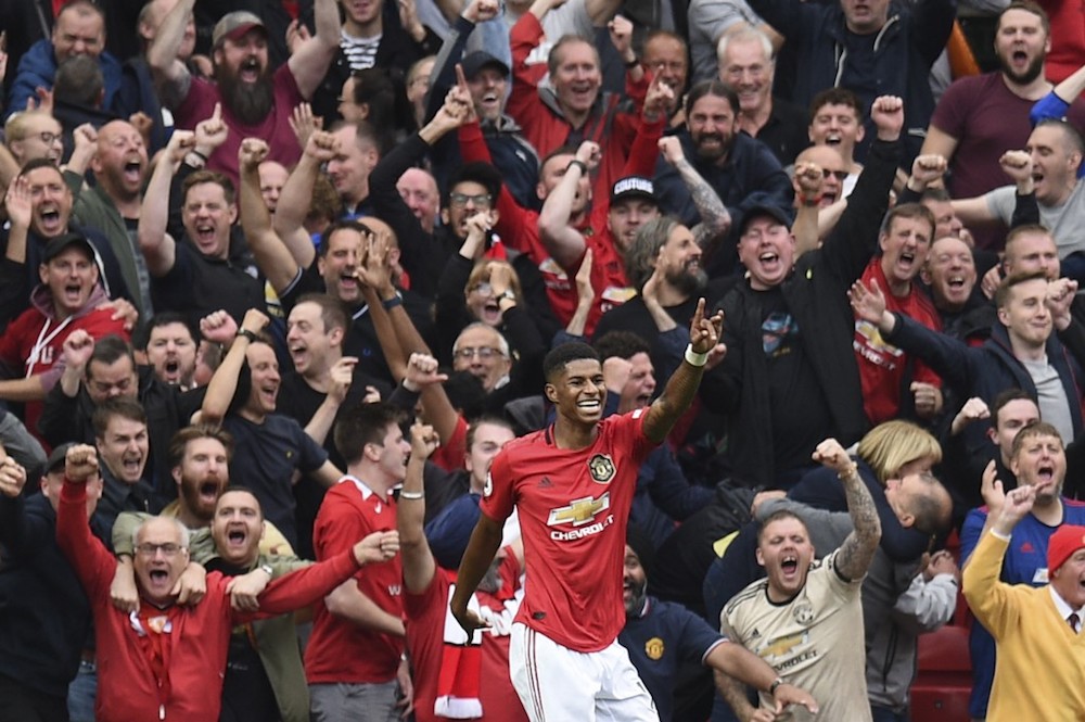 Manchester Unitedu00e2u20acu2122s Marcus Rashford celebrates after scoring their third goal during the English Premier League match with Chelsea at Old Trafford in Manchester August 11, 2019. u00e2u20acu201d AFP pic