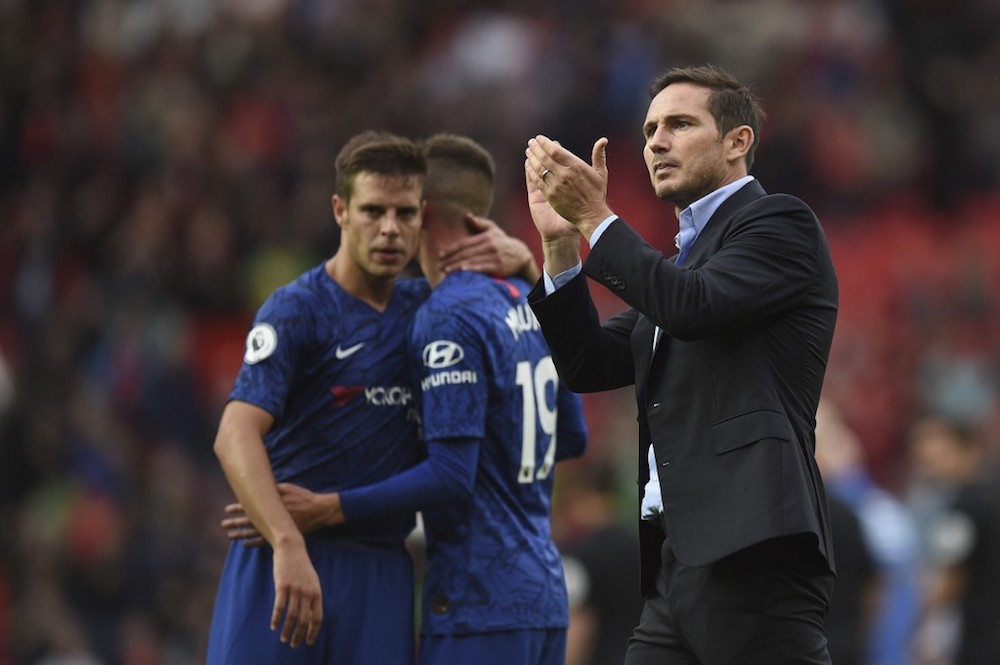 Chelsea manager Frank Lampard applauds supporters on the pitch at the final whistle in the English Premier League with Manchester United at Old Trafford in Manchester August 11, 2019. u00e2u20acu201d AFP pic