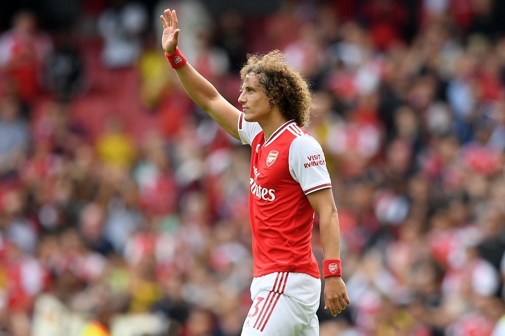 Arsenalu00e2u20acu2122s David Luiz gestures to supporters after the Premier League match with Burnley at the Emirates Stadium in London August 17, 2019. u00e2u20acu201d AFP pic