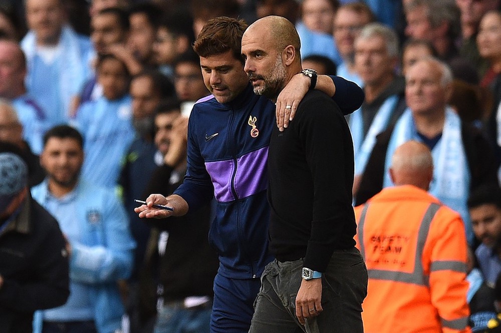 Tottenham Hotspuru00e2u20acu2122s Mauricio Pochettino and Manchester Cityu00e2u20acu2122s Pep Guardiola talk after a VAR decision ruled out what would have been Cityu00e2u20acu2122s third goal during their Premier League match at the Etihad Stadium in Manchester August 17, 2019. u00e2u20acu201d AFP pic