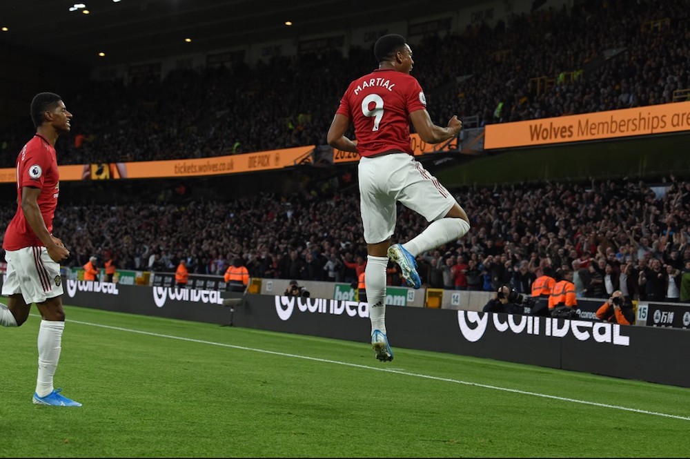 Manchester Unitedu00e2u20acu2122s Anthony Martial celebrates scoring the opening goal during the Premier League match with Wolverhampton Wanderers at the Molineux stadium in Wolverhampton August 19, 2019. u00e2u20acu201d AFP pic