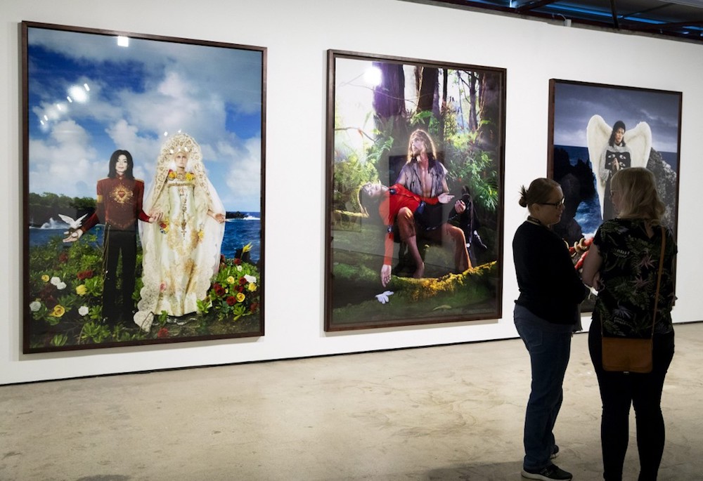 Pictures by US photographer David LaChapelle are seen at the exhibition ‘Michael Jackson: On the Wall’ in Helsinki August 20, 2019. — AFP pic