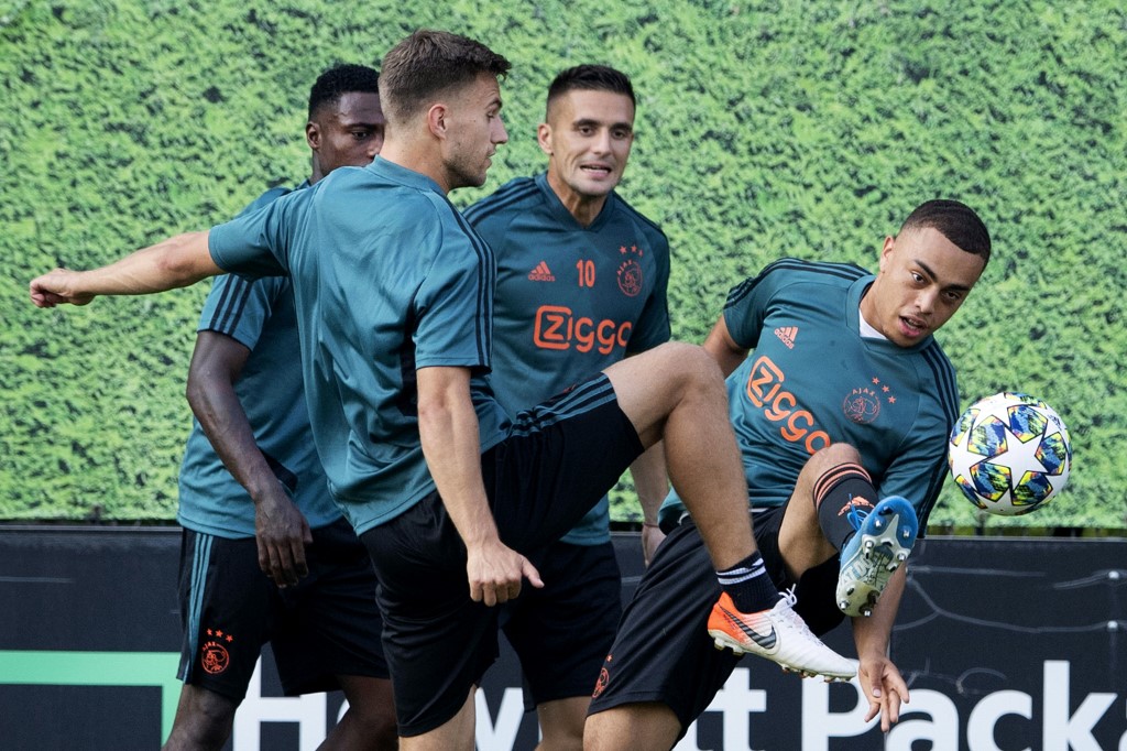 Ajax Amsterdamu00e2u20acu2122s Dutch player Sergino Dest (right) vies with Ajax Amsterdamu00e2u20acu2122s Joel Veltman (second left) during a training session in Amsterdam August 27, 2019. u00e2u20acu201d AFP pic