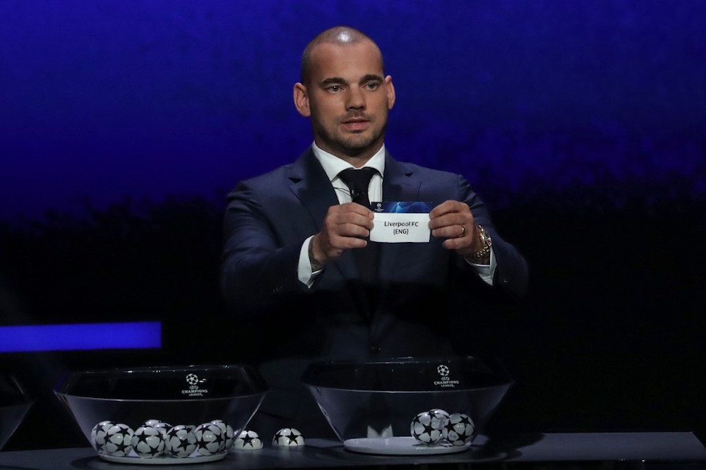 Former Dutch international Wesley Sneijder holds the slip of Liverpool FC during the Uefa Champions League group stage draw ceremony in Monaco August 29, 2019. u00e2u20acu201d AFP pic