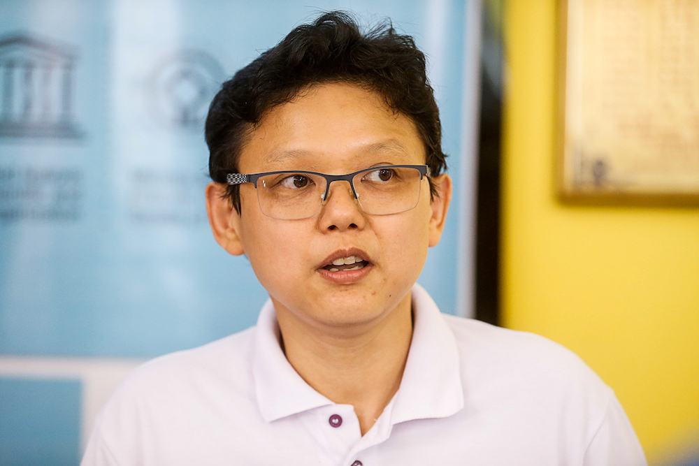 George Town World Heritage Inc general manager Ang Ming Chee speaks to the press about the Textiles Conservation Community Project in George Town August 2, 2019. 