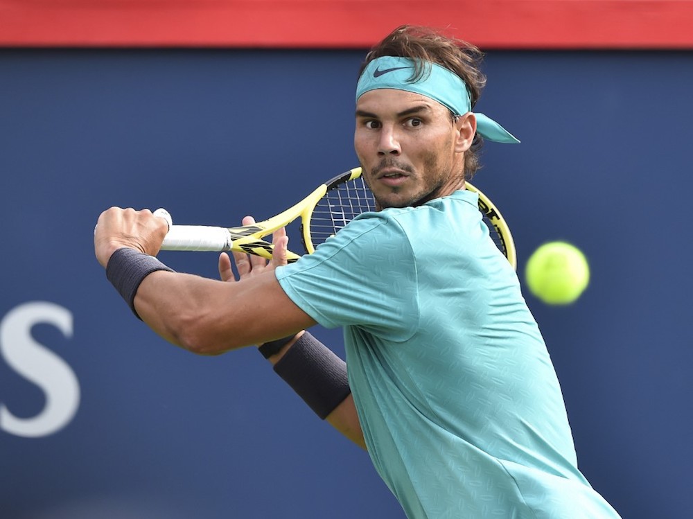 Rafael Nadal of Spain keeps his focus on the ball against Daniil Medvedev of Russia during the menu00e2u20acu2122s singles final of the Rogers Cup in Montreal August 11, 2019. u00e2u20acu201d AFP pic