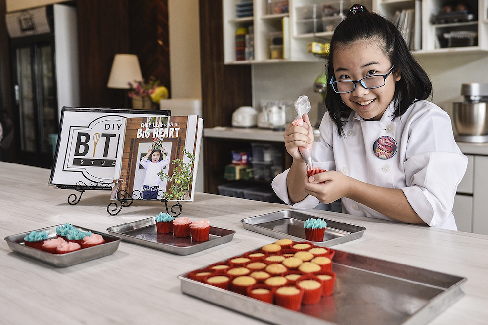 Nine-year-old Leah Choy began baking at age four to raise funds for her younger sisteru00e2u20acu2122s medical needs. u00e2u20acu201d Picture by Miera Zulyana