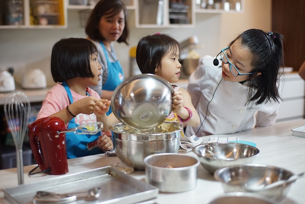 Choy conducting a pinata cupcake workshop for children. — Picture courtesy of DIY Bites Studio 
