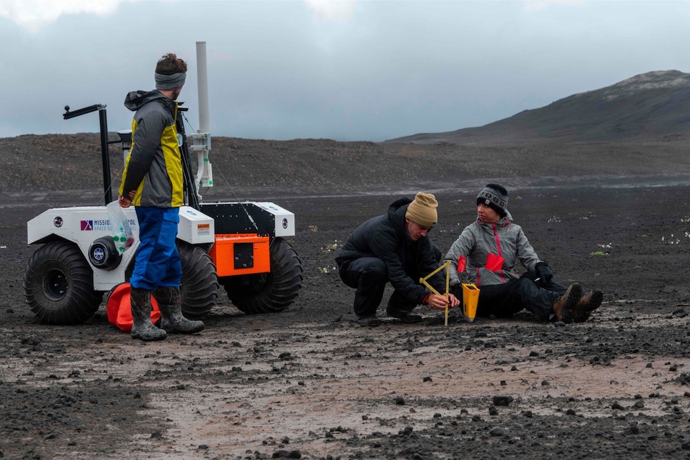 In this picture taken on July 19, 2019 shows scientists working at the Nasa base at the Lambahraun lava field in Iceland where they are getting their new robotic space explorer ready for the next mission to Mars. u00e2u20acu201d AFP pic
