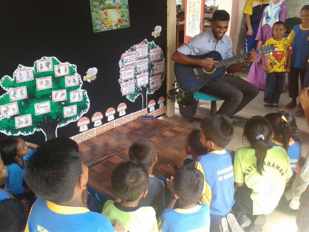 The passionate educator says he is furthering his studies to contribute continuous change for his Orang Asli kids. u00e2u20acu201d Picture from Twitter/Samuel Isaiah
