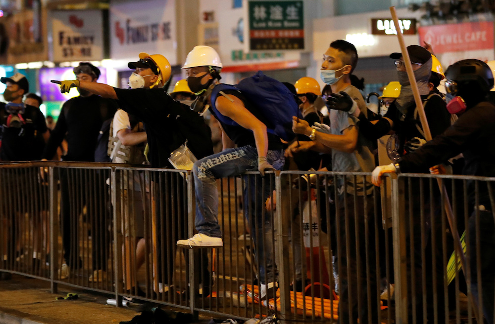 Demonstrators shout slogans at a group of people opposing the anti-government protesters, during a demonstration in support of the city-wide strike and to call for democratic reforms in Hong Kong August 5, 2019. u00e2u20acu201d Reuters pic