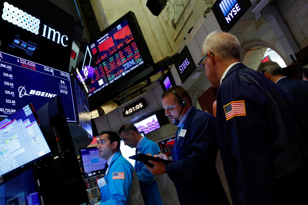 Traders work on the floor at the New York Stock Exchange August 14, 2019. u00e2u20acu201d Reuters pic