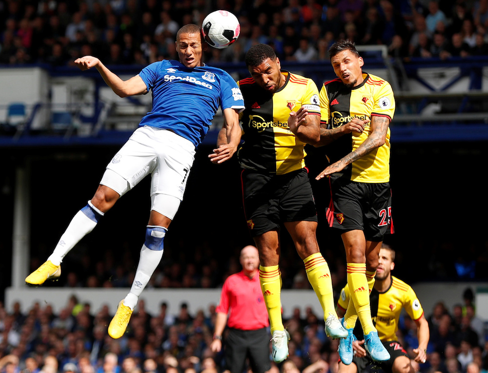 Evertonu00e2u20acu2122s Richarlison in action with Watfordu00e2u20acu2122s Troy Deeney and Jose Holebas during their Premier League match at Goodison Park in Liverpool August 17, 2019. u00e2u20acu201d Action Images pic via Reuters