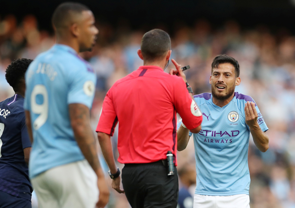 Manchester Cityu00e2u20acu2122s David Silva remonstrates with referee Michael Oliver during the Premier League match with Tottenham Hotspur at Etihad Stadium in Manchester August 17, 2019. u00e2u20acu201d Action Images pic via Reuters