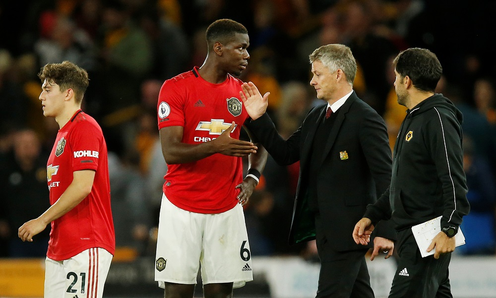 Manchester Unitedu00e2u20acu2122s Paul Pogba with manager Ole Gunnar Solskjaer after the match against Wolverhampton Wanderers at the Molineux Stadium in Wolverhampton August 19, 2019. u00e2u20acu201d Reuters pic 