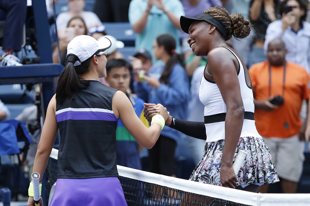 Venus Williams and Saisai Zheng of China shake hands after the first round on day one of the 2019 US Open tennis tournament in New York August 26, 2019. u00e2u20acu201d Picture by Geoff Burke-USA TODAY Sports via Reuters