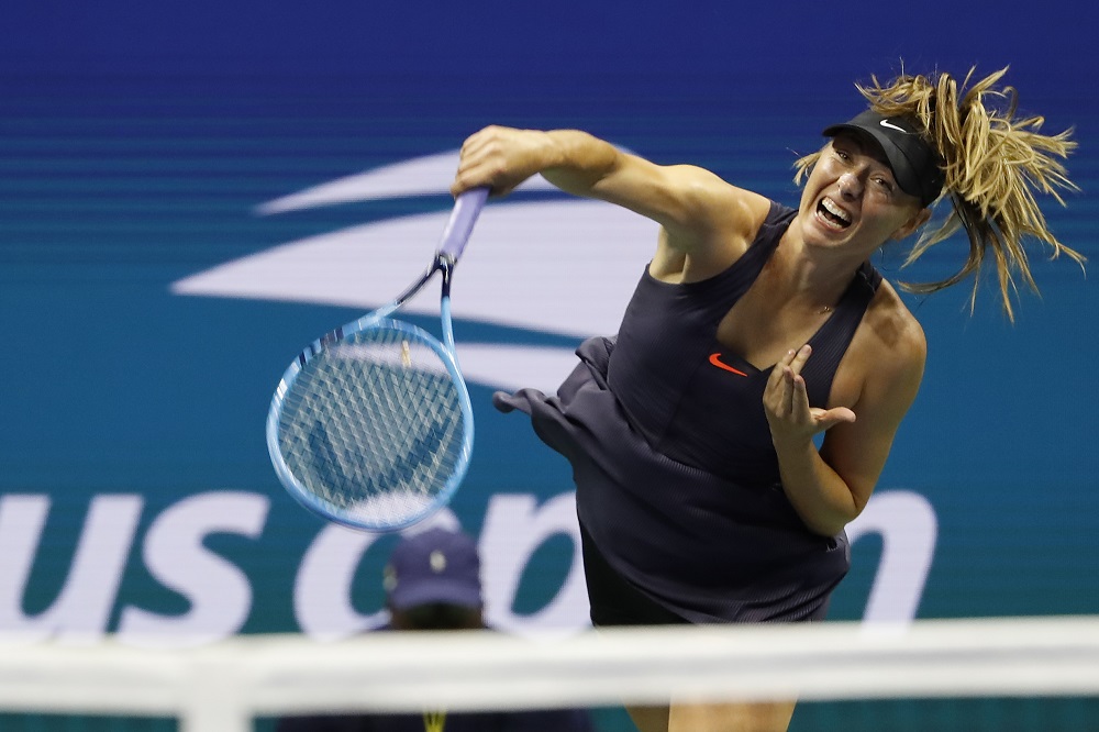 Maria Sharapova serves against Serena Williams in the first round on day one of the 2019 US Open tennis tournament in New York August 26, 2019. u00e2u20acu201d Picture by Geoff Burke-USA TODAY Sports via Reuters