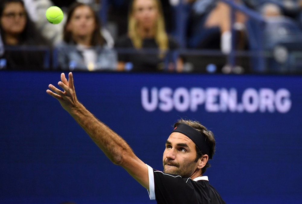 Roger Federer serves to Sumit Nagal in the first round on day one of the 2019 US Open tennis tournament in New York August 27, 2019. u00e2u20acu201d Picture by Danielle Parhizkaran-USA TODAY Sports via Reuters