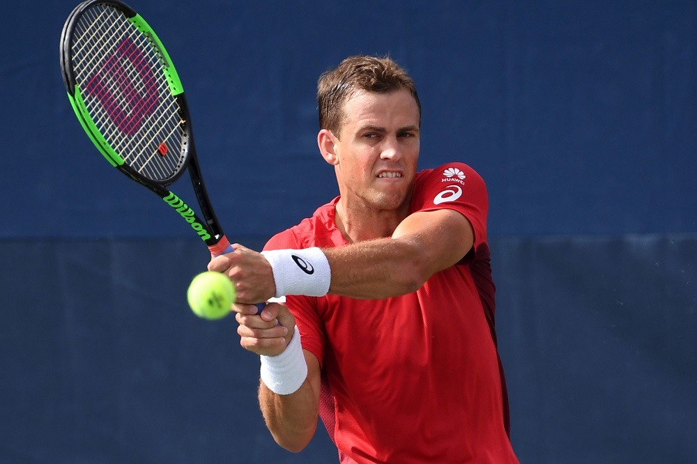 Vasek Pospisil hits to Karen Khachanov on day two of the 2019 US Open tennis tournament in New York August 27, 2019. u00e2u20acu201d Picture by Danielle Parhizkaran-USA TODAY Sports via Reuters