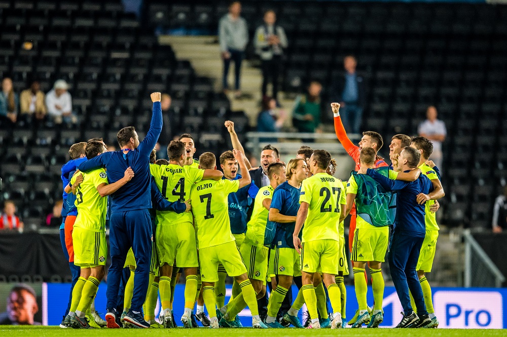 Dinamo Zagreb players celebrate after the Champions League play-off match against Rosenborg in Trondheim August 27, 2019. u00c2u00acu00e2u20acu201d  Picture by Marius Simensen/ BILDBYRAN via Reuters