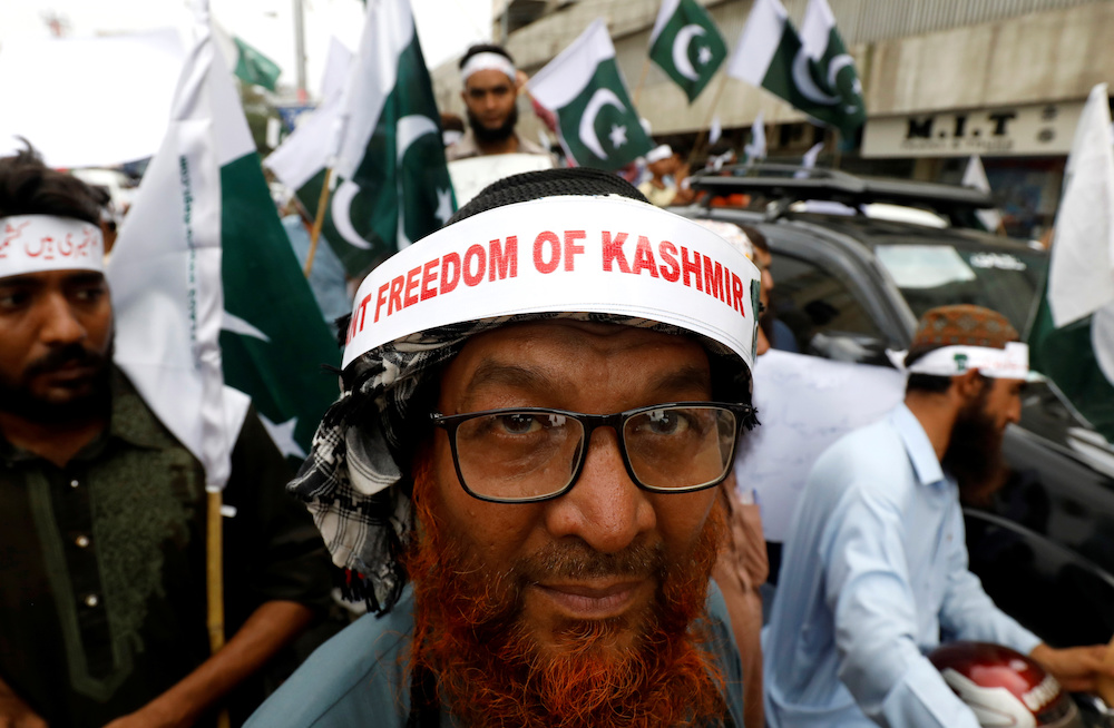 A man with a sign on his forehead attends a rally with others in solidarity with the people of Kashmir, in Karachi August 5, 2019. u00e2u20acu201d Reuters pic