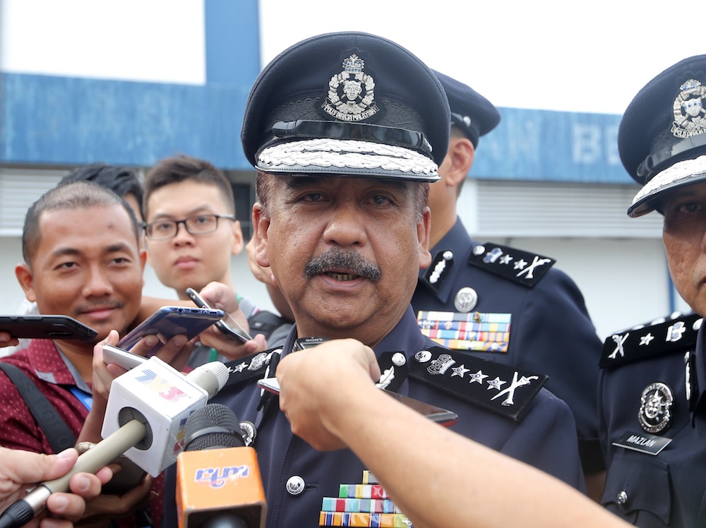 Perak police chief Datuk Razarudin Husain speaks to reporters at the state police headquarters in Ipoh August 7, 2019. u00e2u20acu201d Picture by Farhan Najib
