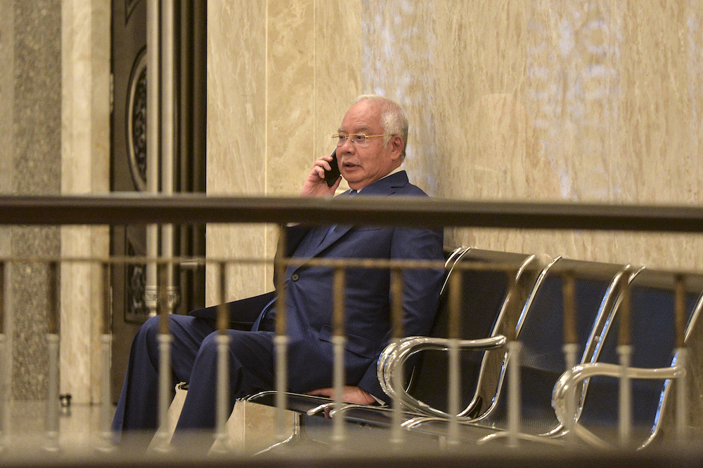 Datuk Seri Najib Razak is seen at the Palace of Justice in Putrajaya August 7, 2019. u00e2u20acu201d Picture by Shafwan Zaidon