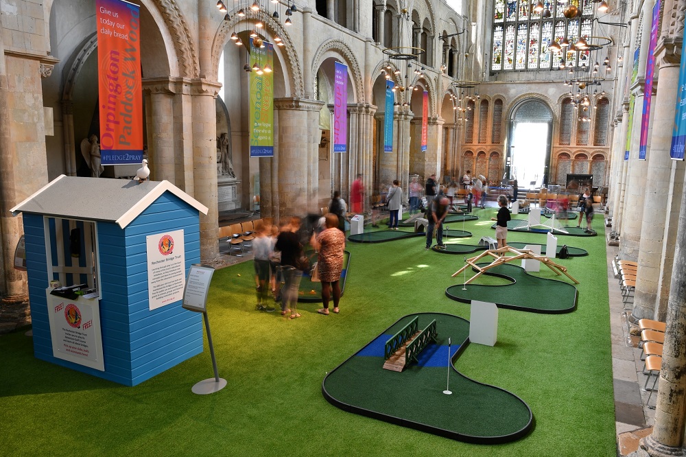 In this file photo taken on August 6, 2019 people play on the bridge-themed mini-golf course set up in the nave of Rochester Cathedral in Rochester, south-east England. u00e2u20acu201d AFP pic