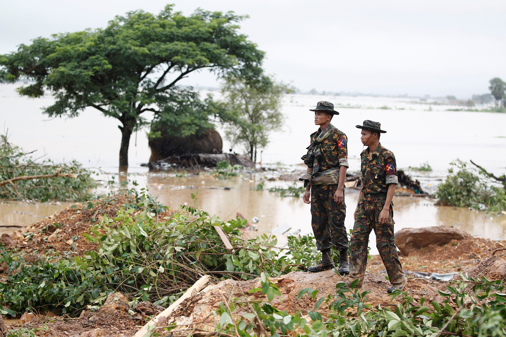 Rescue workers search for bodies under the debris and mud after a landslide in Mottama, Mon state, Myanmar, August 10, 2019. u00e2u20acu201d Reuters pic