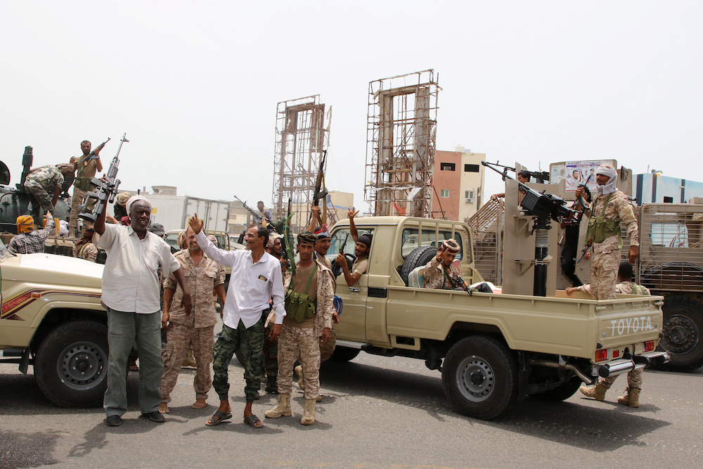 Members of UAE-backed southern Yemeni separatist forces shout slogans as they patrol a road during clashes with government forces in Aden, Yemen August 10, 2019. u00e2u20acu201d Reuters pic