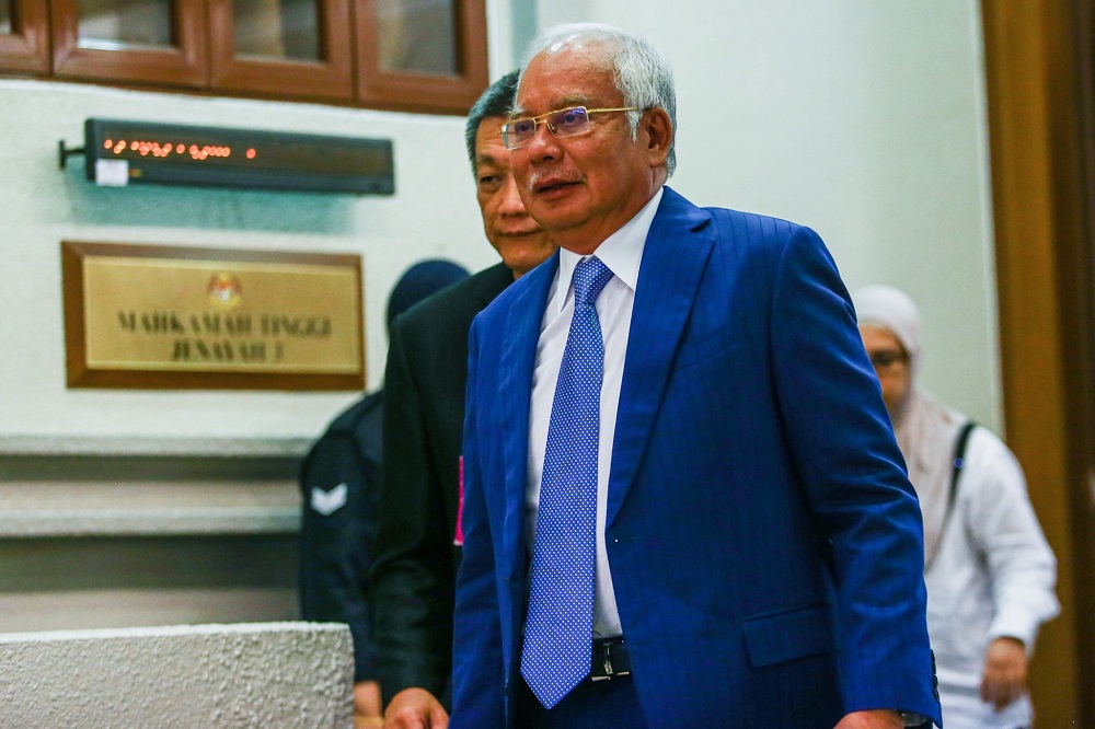 Datuk Seri Najib Razak leaves the courtroom at the Kuala Lumpur Court Complex August 13, 2019. u00e2u20acu201d Picture by Hari Anggara