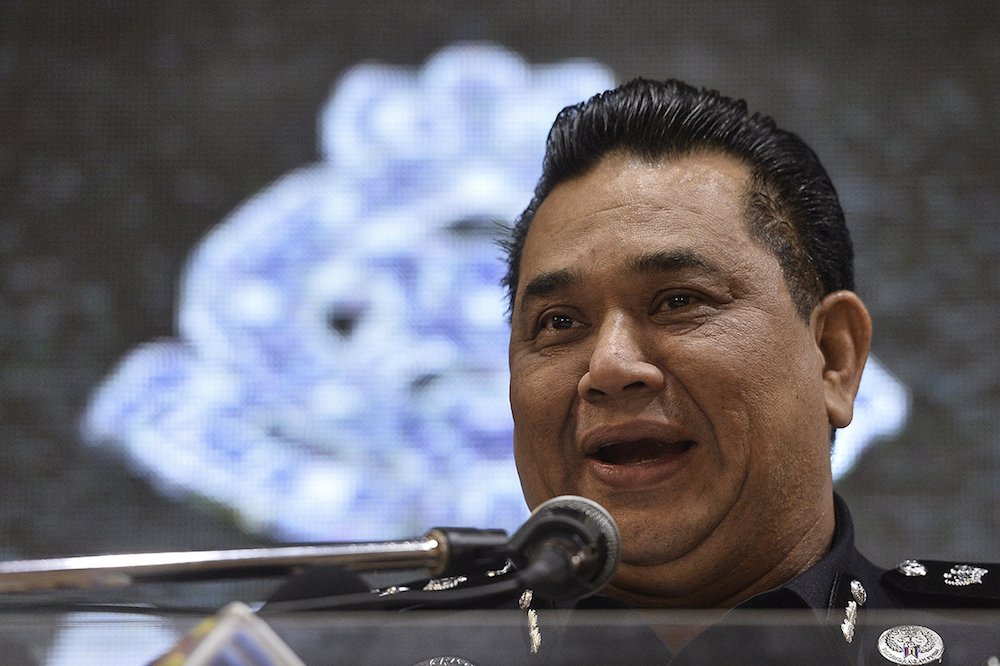 CID Director Datuk Huzir Mohamed speaks during a press conference at the Selangor Contingent Police Headquarters in Shah Alam August 15, 2019. u00e2u20acu201d Picture by Miera Zulyana
