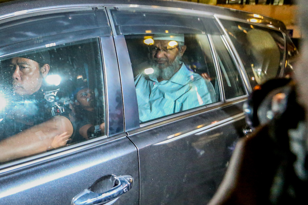 Islamic preacher Dr Zakir Naik leaves Bukit Aman in Kuala Lumpur August 16, 2019. u00e2u20acu201d Picture by Firdaus Latif